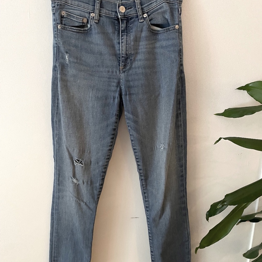 Distressed straight jeans